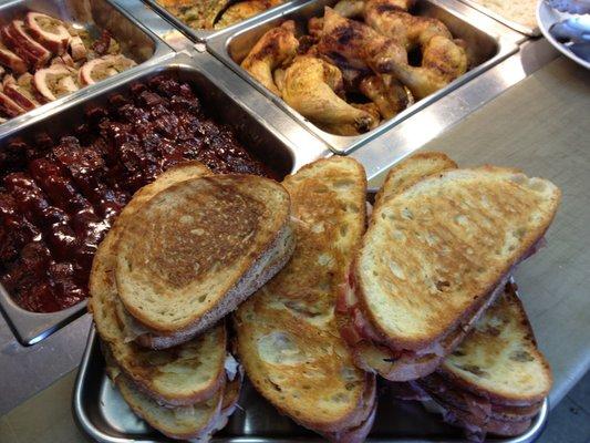 Grilled panini (bottom), BBQ ribs, and baked chicken (above)