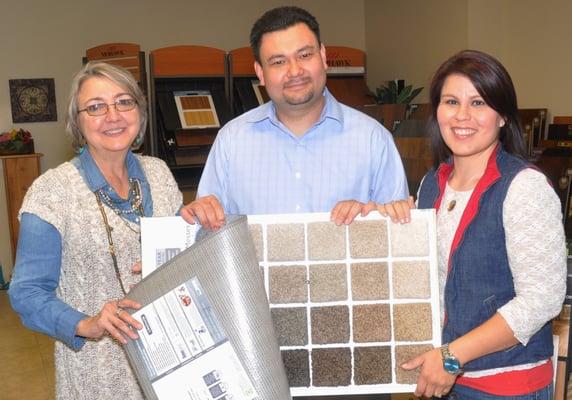 Lynette with new owners, Bill and Christina Derixson.