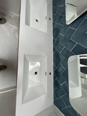 Here is a photo of a client who called me to install a bathroom countertop for their kids.