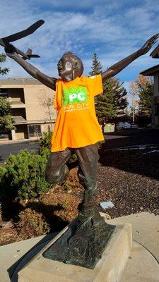 Statue with charity T shirt in front of Wells Fargo W 11.1.23