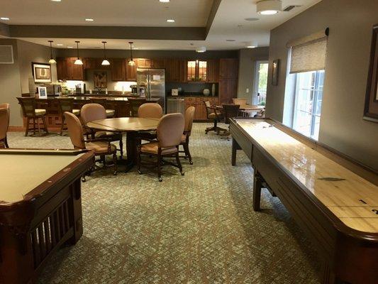 Game Room with Pool, Shuffleboard and Game Tables.