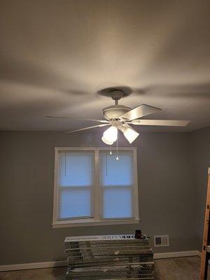 Ceiling fan installation.