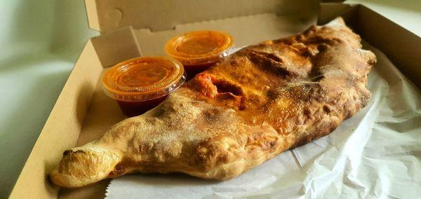 Huge calzone ordered for delivery by Slice. Excellent.