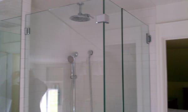 Shower surround and rain shower head