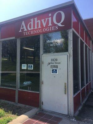 Front door of AdhviQ Technologies building.