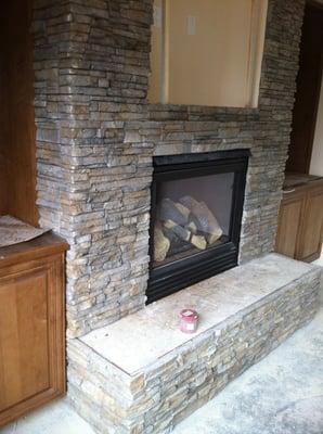 Cultured stone fireplace