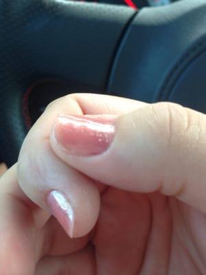 Existing polish not even taken off completely and gap on sides of nails.