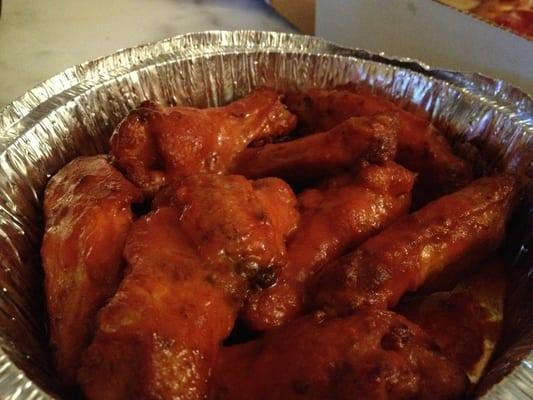 Spicy hot wings (w/1 large pizza and 2liter soda) for $14 [including tax]