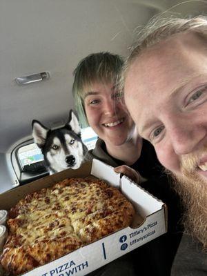 Happy customers and curious doggo!