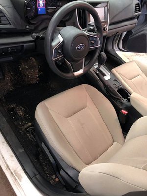 Dirty drivers side of a Subaru