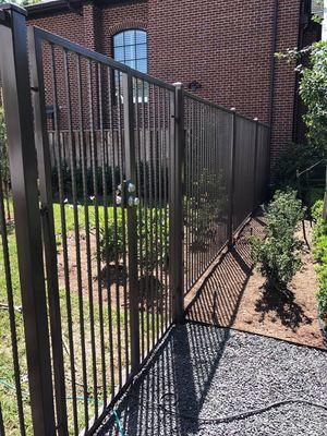 Iron gates and fence.