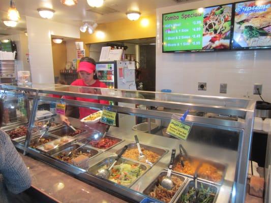 Inside the Lenox Square Mall food court, near the entrance.