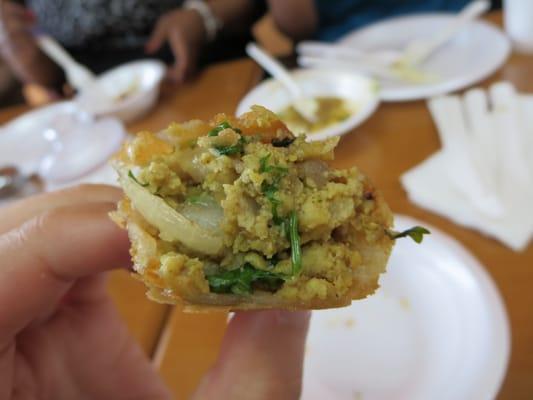 Close-up of inside of chicken samosa.