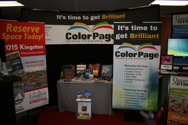 ColorPage attends trade show to display printing large format signs, self publishing books, websites, custom publishing magazines.