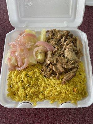 yellow rice, lechon (roast pork), boiled yucca in garlic sauce with red onions