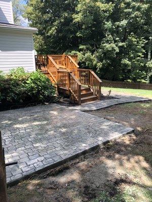 Stamped concrete cobblestone pad