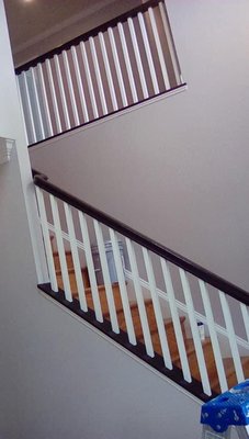 Wall paint and stained hand rails