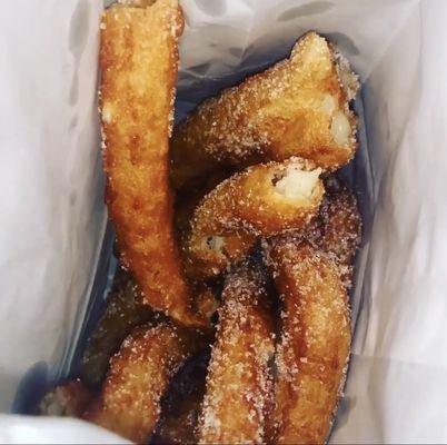 Paper baggy of crispy churro goodness