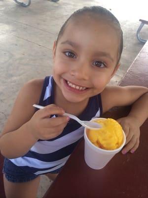 Enjoying her mango shaved ice!