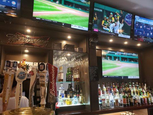 Beers on tap and TV behind the bar