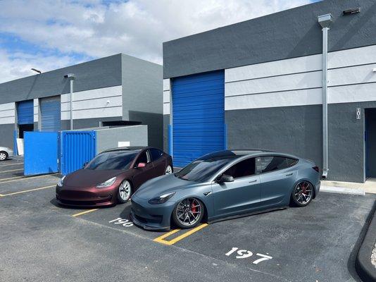 Both tesla model 3's wrapped, bagged, and fully tinted with ceramic window tint.