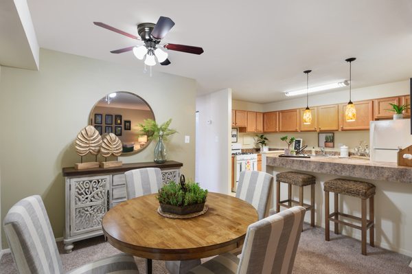 Dining room with breakfast bar and pendant lights