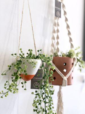 Hanging planters can make those weird empty spaces look brighter.