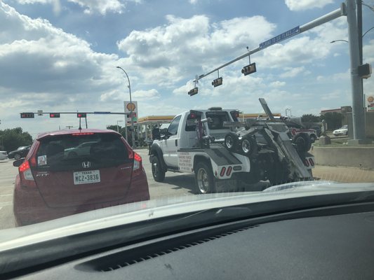 Incompetent sack of meat driving a tow truck.