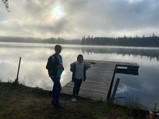 Kids enjoying the morning dock calmness.