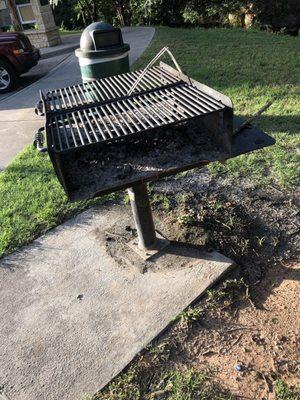 Huge grill next to the gazebo.