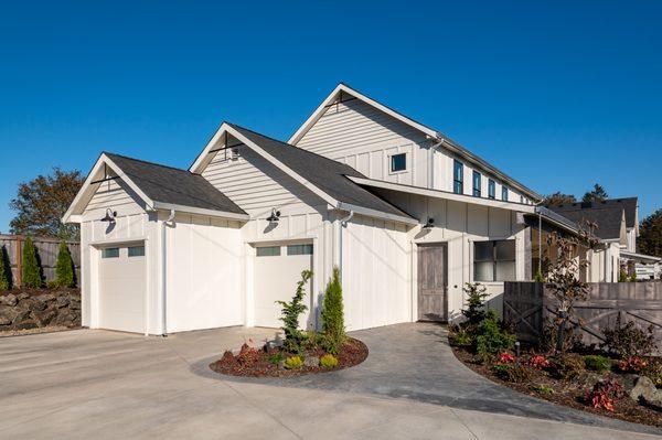 Custom Built home - Entryway with custom fabricated doors