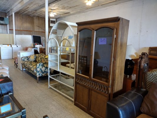 Appliances and mattresses on the furniture side.