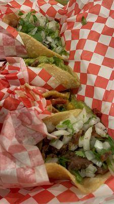 Tacos- one of each- carne asada is the best !