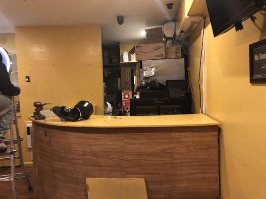 Commercial space in Brooklyn called Mac shack this is the picture before the new counter