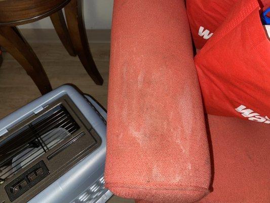 dirty arm chair