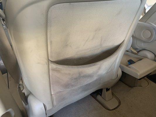 Before cleaning the back of this seat from foot prints