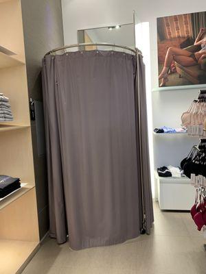 This is the fitting curtain in the store where women try on bras