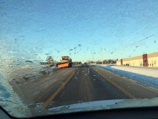 Clearing county street near Sheriff's Office.