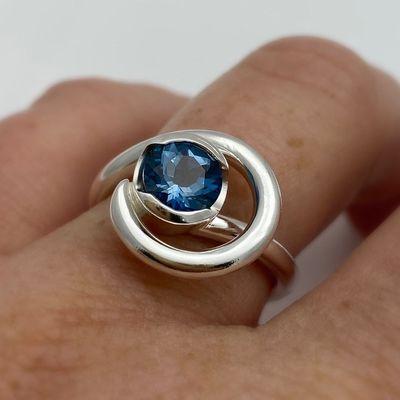 Wrapped Blue Topaz ring in Sterling silver