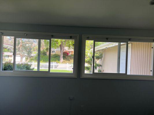 Vinyl retrofit white windows