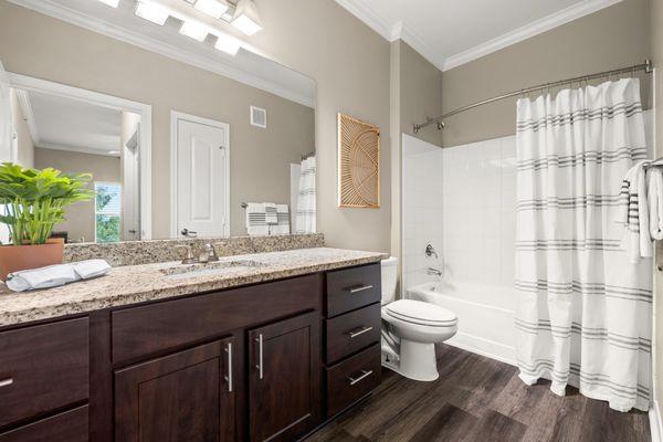 Bathroom with walk in shower and tub at Estancia at Ridgeview Ranch