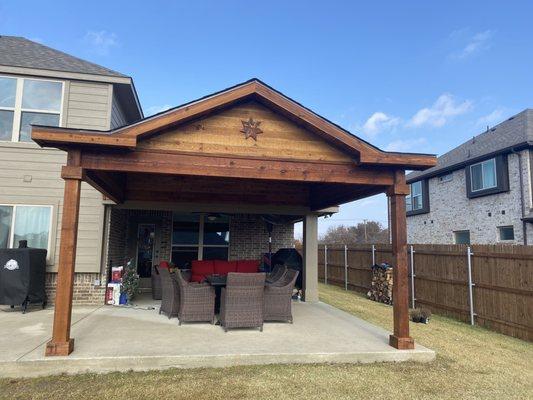 Patio extension with roof and concrete