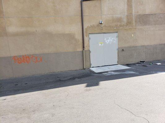 Graffiti  all over the store parking lot..this is so sad that no one cares to take care of it or call it in