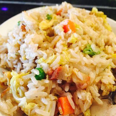 This is our House Special Fried Rice. It comes with pork, chicken, shrimp, and vegetables (onions and bean sprouts).