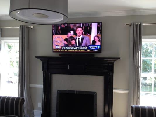 55" LED Samsung 7000 and Soundbar. Mounted on drywall over brick. All lines ran to closet in hallway. Dual Band IR Repeater