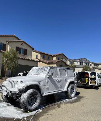 Wife's Jeep getting her suds on