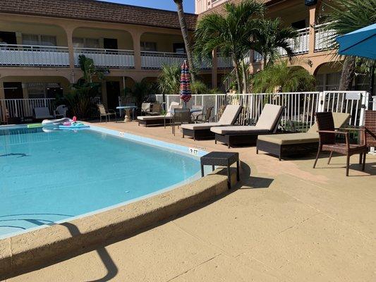 Swimming pool with very comfy deck chairs