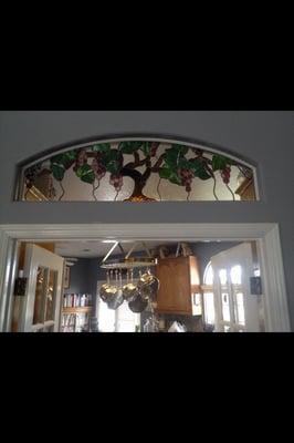 Grapevine window with glass and material purchased from Gargoyle Stained Glass!