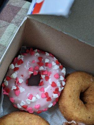 Strawberry frosted cake donut