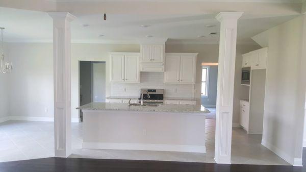 All of our kitchens have solid wood cabinets with soft close hinges and we exhaust to the outside